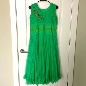 Light green salwar kameez with a ruffle design